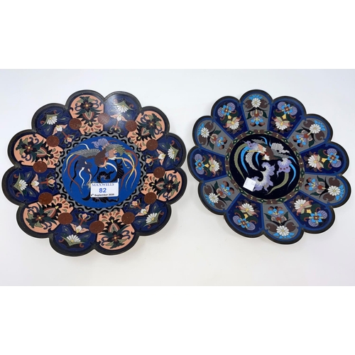 82 - An early 20th century Japanese near matching cloisonné dishes of circular shallow lobed form, with c... 