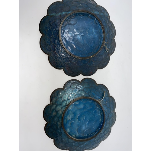 82 - An early 20th century Japanese near matching cloisonné dishes of circular shallow lobed form, with c... 