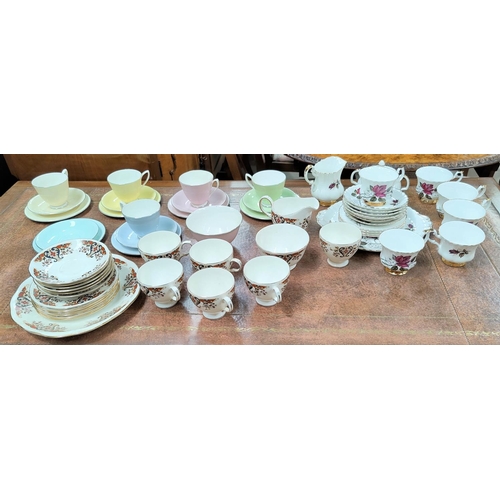 161 - A Royal Albert part Harlequin tea service, a Colclough part tea service and another