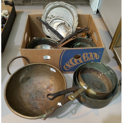 397 - A large selection of 19th century brass and copper pans; etc.