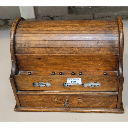 410 - An Edwardian oak correspondence box with roll top, base drawer and perpetual calendar, length 30 cm ... 
