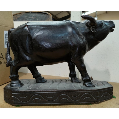 416 - An oriental large carved wood water buffalo (horn a.f.)