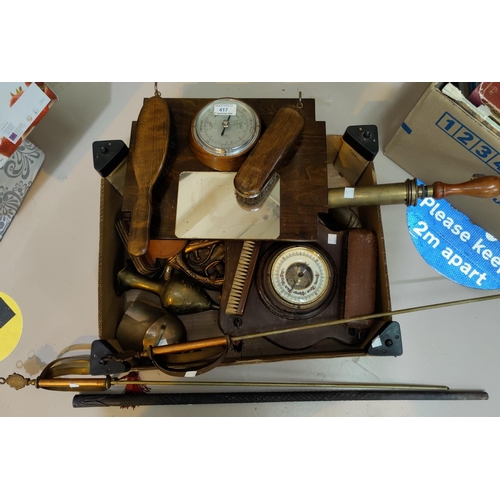 417 - Two 1930's barometer/brush racks; a brass stirrup pump; a carved ebonised walking cane; ornamental b... 
