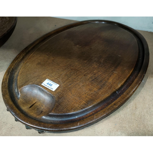 446 - An early 19th century oval hardwood carving platter, 49cm