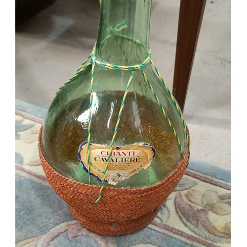 47A - A vintage yard of Chianti bottle