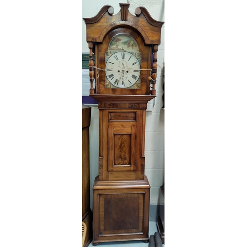 520 - A large mid 19th Century figured mahogany long case clock with swan neck pediment and turned pillars... 