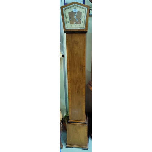 523 - A 1930's crossbanded walnut Westminster chiming grandmother clock