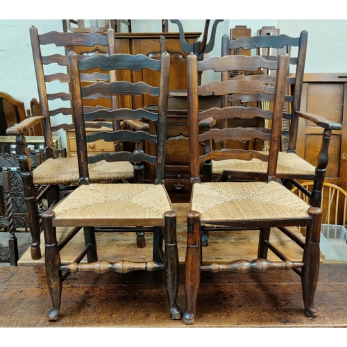 534 - A near matching set of 8 (6+2) 19th Century countrymade elm ladder back dining chairs with rush seat... 