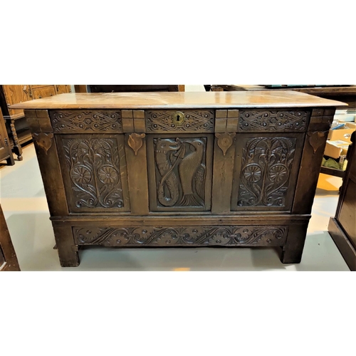 546 - 18th century framed and panelled oak mule chest with later carved decorated hinged lid, base and dra... 