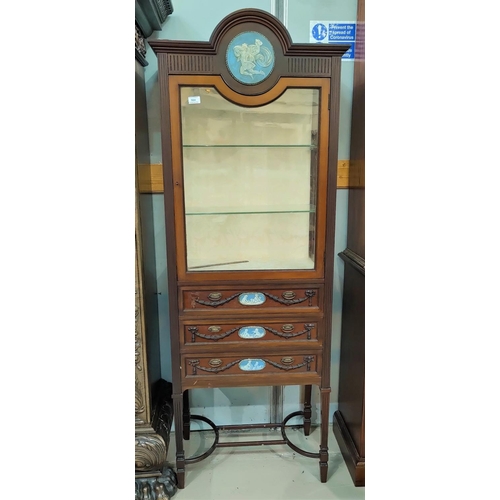 564 - An Edwardian mahogany narrow display cabinet with painted roundel, 
glazed door over 3 drawers