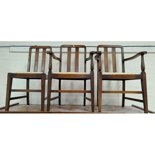 572 - A 1930's set of 6 (4 + 2) oak dining chairs with rail backs