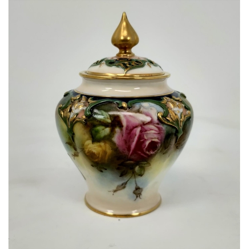 186 - A Hadley's Worcester potpourri of tapering form with pierced lid, hand painted with roses, height 14