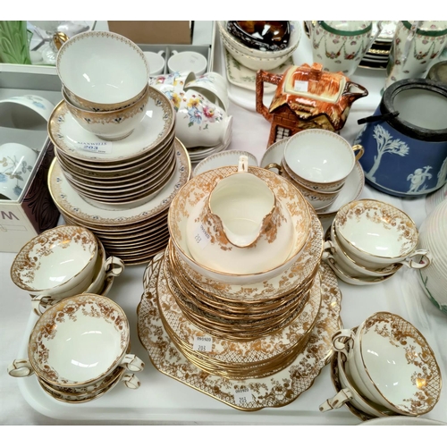 203 - A Limoges white and gilt tea service, 29 pieces; Hammersley ornate gilt part tea service 38 pieces; ... 