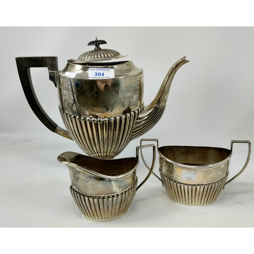 304 - A hallmarked silver 3 piece pedestal coffee set in the Georgian style with reeded lower sections, Bi... 