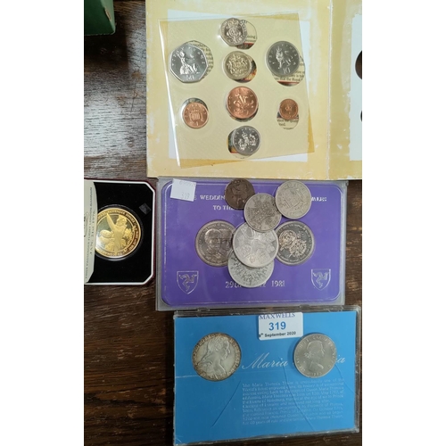 319 - A Maria Theresa Thaler; other commemorative coins; commemorative sets; crowns; a 'Concorde' medallio... 