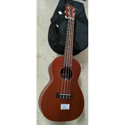 443 - A Kanai ukulele with gig bag, strap, etc.