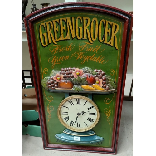 449 - A retro 'Greengrocer' kitchen clock in painted wood surround, 83 x 45cm