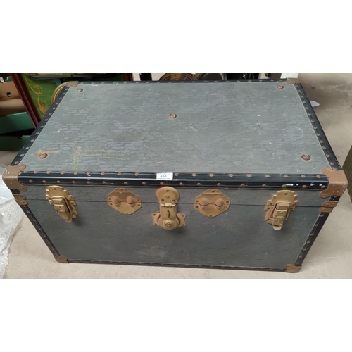 450 - A vintage metal bound steamer trunk