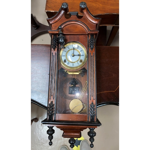 539 - An Edwardian striking mantel clock in mahogany balloon top case; a 1930's striking mantel clock; a r... 