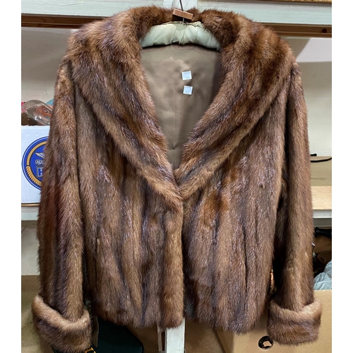 100 - A brown mink jacket