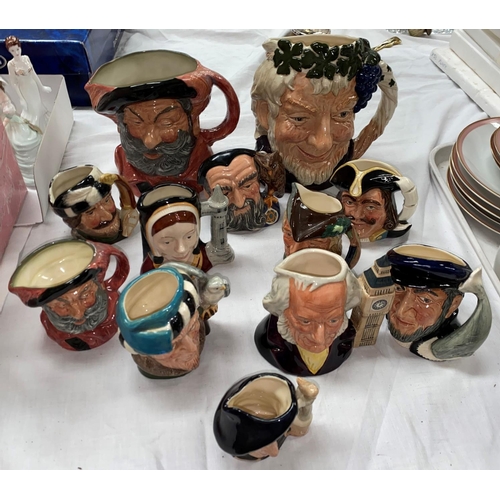 194 - 2 large Royal Doulton character jugs- Falstaff, Bacchus and 10 small Doulton jugs.