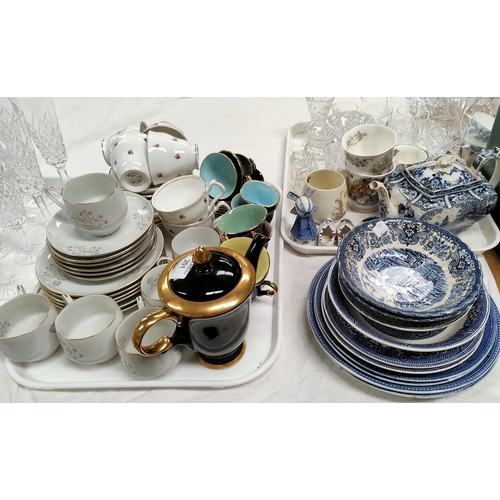 201 - A 1950's black and gilt coffee set; various part tea services; glassware