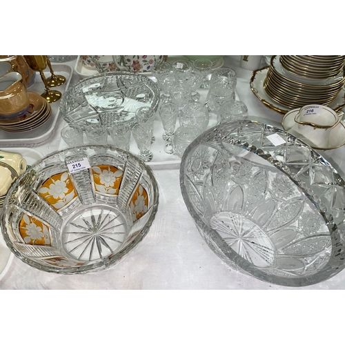 215 - An amber overlaid and cut fruit bowl, a heavy cut basket, 6 cut punch cups and other glassware