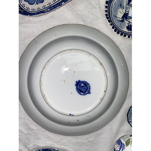 241 - A Meissen onion pattern dish; 2 Delft triangular plates with tin glaze; etc.