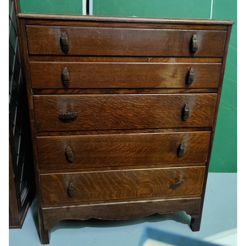 564 - An Oak five height chest of drawers