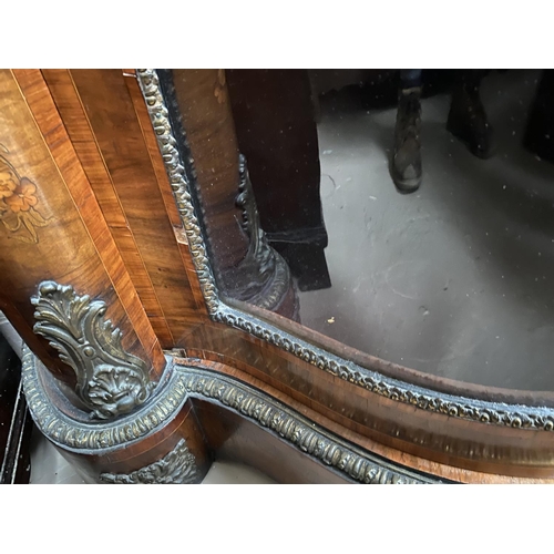 573 - A 19th century Louis XV style serpentine font walnut credenza with extensive ormolu mounts and marqu... 