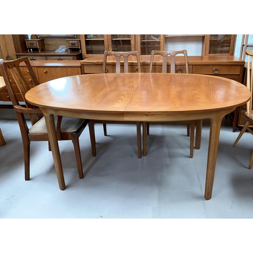 595 - A 1960's Nathan teak dining suite comprising oval extending table, 6 (4 + 2) high back chairs, and s... 