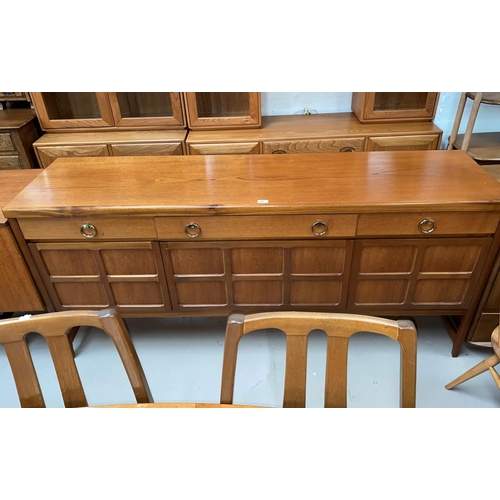 595 - A 1960's Nathan teak dining suite comprising oval extending table, 6 (4 + 2) high back chairs, and s... 