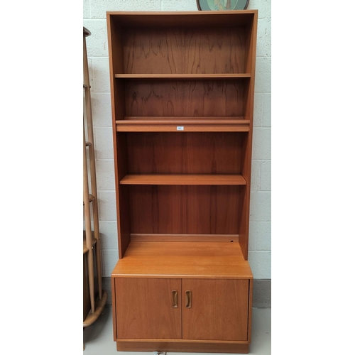 602 - A 1960's G-Plan teak full height bookcase with double cupboard