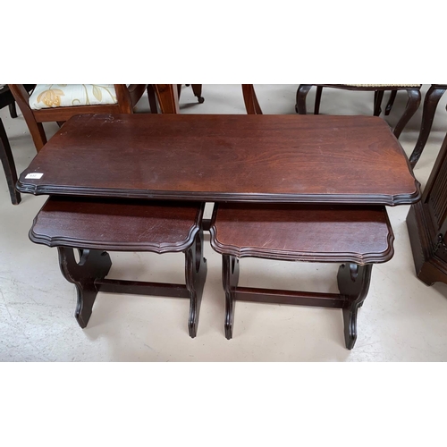 632 - A mahogany reproduction nest of tables, coffee & 2 occasional tables; a coffee table with beaten cop... 