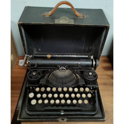 18 - An early/mid 20th portable typewriter by Underwood, in case
