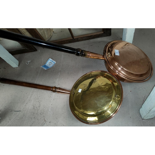 72 - A brass and copper warming pan; another copper item