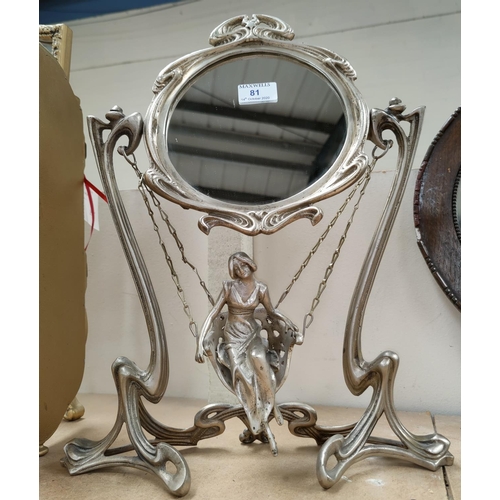 81 - An Art Nouveau style silvered mirror with girl on swing