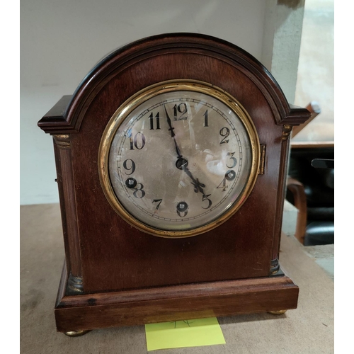 82 - A mahogany cased mantel clock