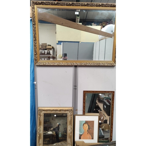 9 - A wall mirror in rectangular gilt frame; a textured print: 18th century interior, gilt framed; other... 