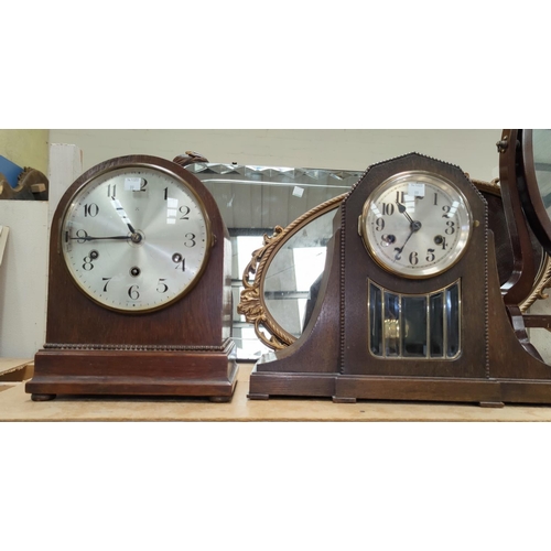 99 - Two oak cased mantel clocks, both with keys and pendula, one chiming, one striking