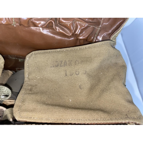 130A - A vintage medical field bag with some original Eastern European packed bandages etc