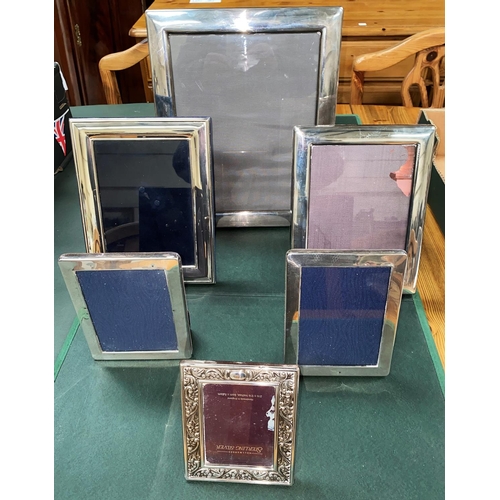 280 - Three small modern hallmarked silver photo frames and 3 similar silver plated