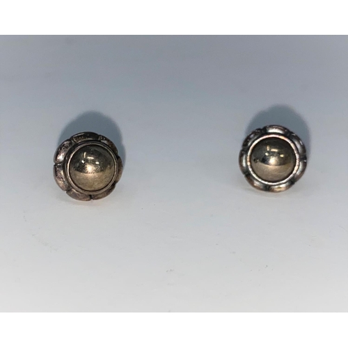 320 - A pair of George Jensen silver stud earrings