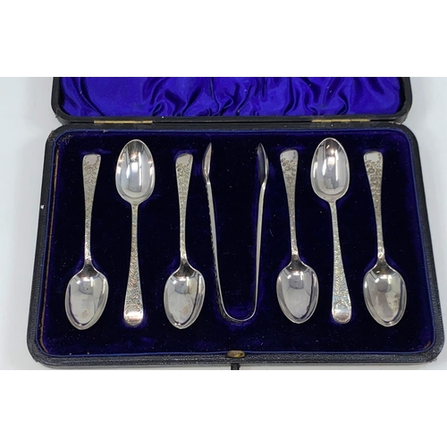 321 - A set of 6 hallmarked silver chased teaspoons and tongs cased, Sheffield 1897, 2.5 oz