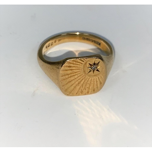 328 - A gents 9 carat hallmarked gold signet ring with starburst decoration, set small diamond, 6.4 gm. Si... 