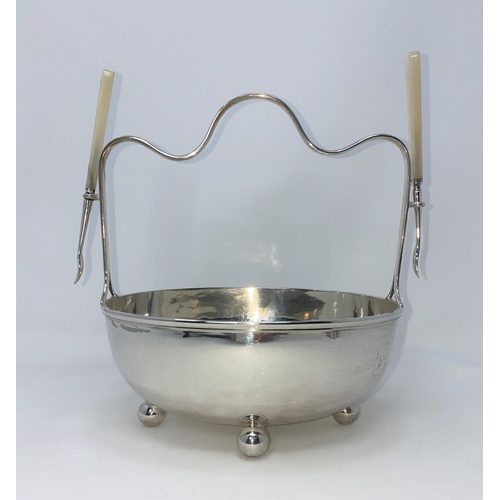 340 - A hallmarked silver nut bowl on ball feet with twin picks and 2 pairs of nutcrackers , bowl Sheffiel... 
