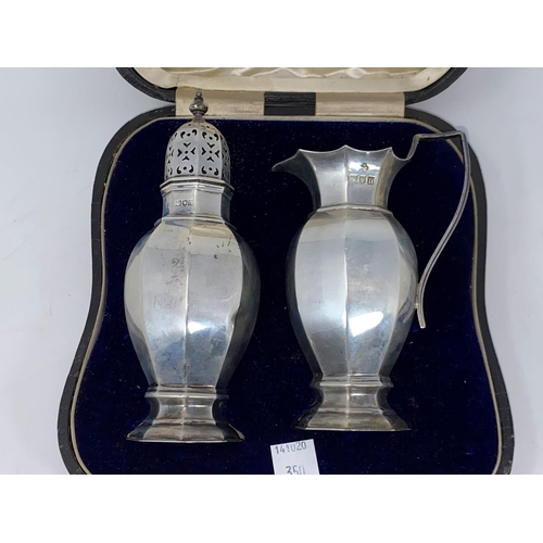 350 - A hallmarked silver strawberry set comprising octagonal cream jug and sugar sifter, London 1908, 8 o... 