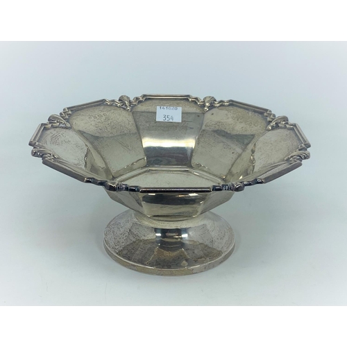 354 - A hallmarked silver octagonal pedestal dish with moulded border, on circular foot, Birmingham 1932, ... 