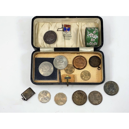 377 - An American silver dollar; a Canadian silver dollar; a 1935 crown; other coins and medallions; a sta... 