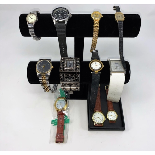 421 - A large selection of mainly Gents quartz fashion watches, including Timex, Sekonda etc.